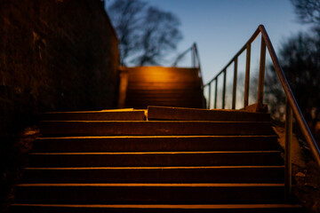 Crooked stair steps close up in the night lights