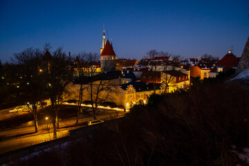 Estonia capital Tallinn night street lights illuminated