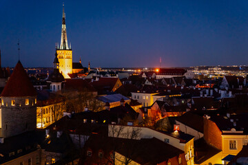 Tallinn old town buildings and rooftops during night time in cold spring