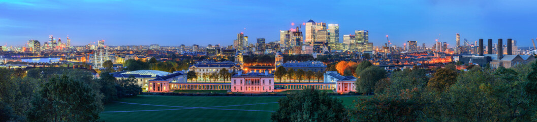 Night panoramic view to Greenwich and Canary Wharf in London