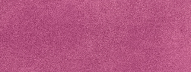 Purple matte background of suede fabric, closeup. Velvet texture of seamless wine textile, macro.