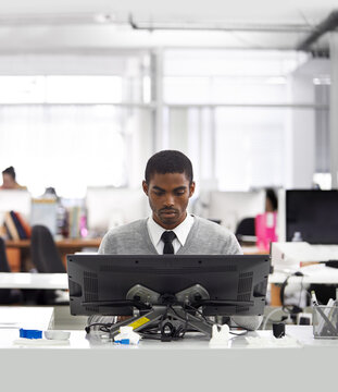 Black man, employee and intern with computer at workplace, office and professional at desk for creative career. African male person, graphic designer and illustrator working on designs on 3D printer