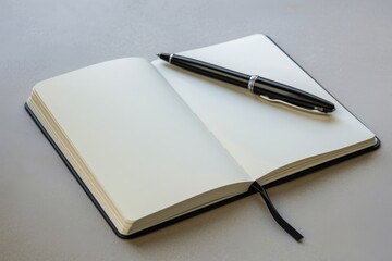 a blank notebook lays open on a table