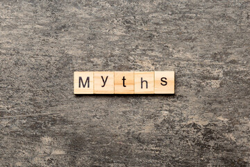 myths word written on wood block. myths text on table, concept