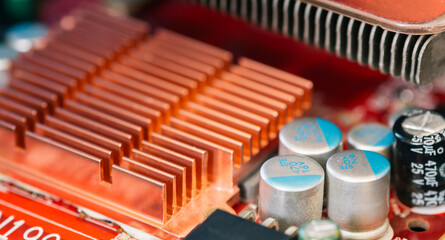 Electronic components, chips and capacitors on the blue pcb, close up view. Technology concept