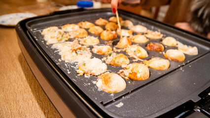 Homemade style Takoyaki octopus rolls.