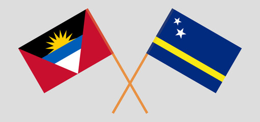 Crossed flags of Antigua and Barbuda and Country of Curacao. Official colors. Correct proportion