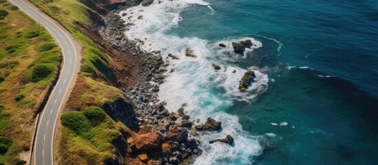 Aerial View of Spectacular Cliffside Road Along Scenic Pandawa Beach in Bali