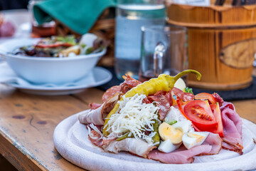 Brettljause, with meal, cheese, vegetable occupied bread traditional Styrian food