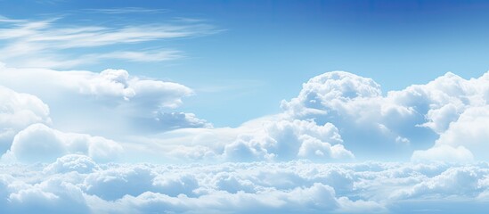 Serene Blue Sky and Fluffy White Clouds in a Tranquil Nature Background