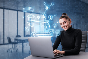 Happy young european female using laptop with abstract glowing seo hologram on blurry office...