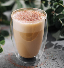 Hot coffee with milk in glass cup