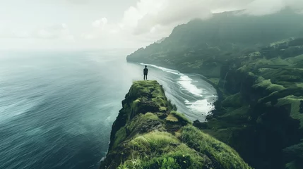 Fotobehang Person admiring the coastal landscape from a cliff overlooking the ocean © Наталья Игнатенко