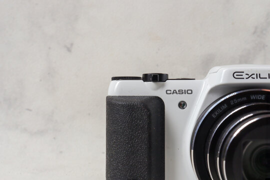 Casio Exilim EX-H50 digital pocket camera isolated on white background