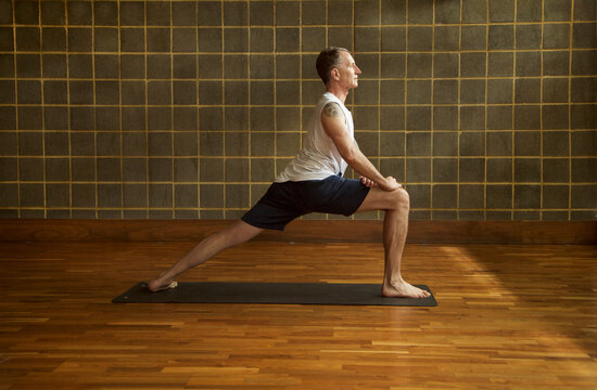 Mature Man Practicing Yoga
