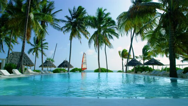 Amazing view of a pool in a luxurious resort near Zanzibar beach.