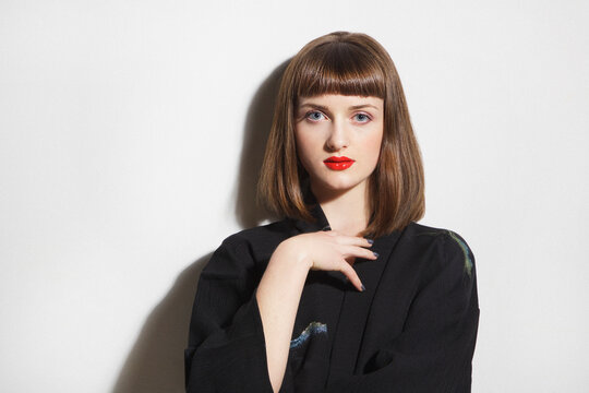 Portrait of Young Woman with Red Lips
