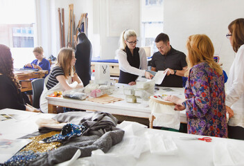 Design Professionals Working at Embroidery Studio
