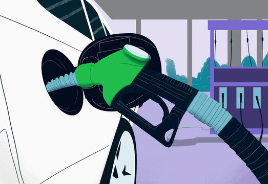 Close up biodiesel gas pump fueling car at gas station

