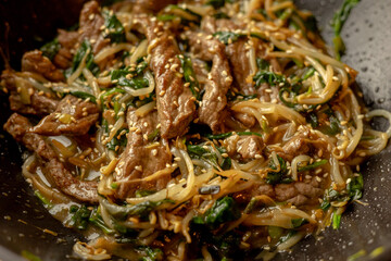 delicious Korean dish: veal in a wok close-up