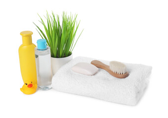 Baby cosmetic products, bath duck, brush and towel isolated on white