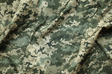 Texture of crumpled camouflage fabric as background, top view