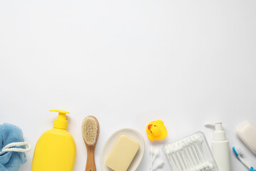 Baby bath accessories and care products on white background, flat lay. Space for text