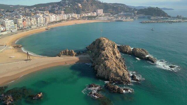 Journey through the coastal paradise of the Costa Brava with our mesmerizing aerial footage, offering a glimpse of Blanes, a medieval jewel along Spain's Mediterranean shore.

