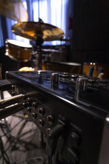Fototapeta na wymiar Close-up of a professional music mixer in the studio, selective focus. Vertical photo