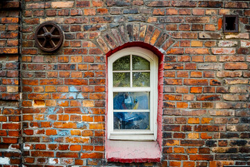 Brick house with window, Nikiszowiec, Katowice, Silesia, Poland - 752156355