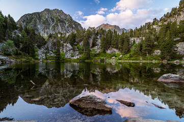 Fototapeta na wymiar Reflection on the beautiful mountain lake