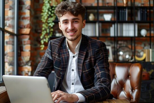 Photo depicts a youthful entrepreneur in a suit, comfortably seated in his office, engaging in a video call on his laptop. Generated AI