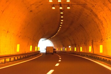 Little traffic in a motorway tunnel on the Brenner Pass with new colored road boundaries and new...
