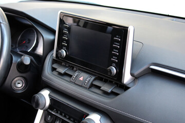 Screen multimedia system. Interior of a modern luxury car. Control panel in a modern car. Modern...