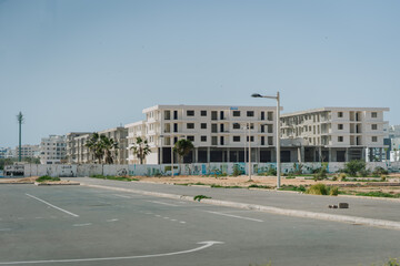 Agadir, Morocco - February 25, 2024 - New apartment buildings under construction in a developing...