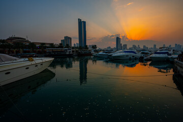 Radiant Sunset Rays Over Marina Crescent in Salmiya, Kuwait