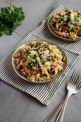 Homemade One-Pot Bacon And Mushroom Risotto on a Plate, side view.