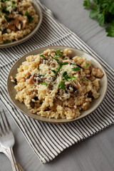 Homemade One-Pot Bacon And Mushroom Risotto on a Plate, side view.