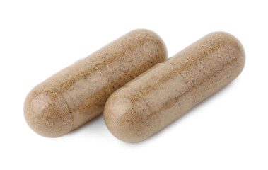 Vitamin capsules isolated on white. Health supplements