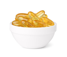 Yellow vitamin capsules in bowl isolated on white