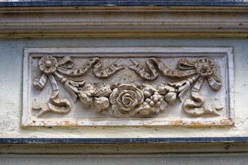 Old town of Slovenian City of Kranj with close-up of flower ornaments at historic house facade on a sunny summer day. Photo taken August 10th, 2023, Kranj, Slovenia.