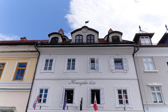 Old town of Slovenian City of Kranj with building named Kranjska Hisa at town square named Glavni on a sunny summer day. Photo taken August 10th, 2023, Kranj, Slovenia.