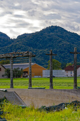 Scenic view of hay rack at farmland at village of Zabnica on a blue cloudy summer evening. Photo taken August 10th, 2023, Zabnica, Kranj, Slovenia.