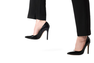 Businesswoman in leather shoes on white background, closeup