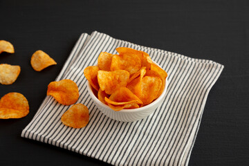 Paprika Potato Chips in a Bowl, side view.