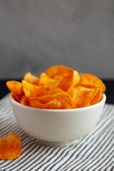 Paprika Potato Chips in a Bowl, side view.