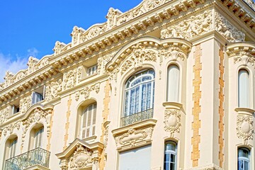 Windows France. Nice. Classic old wooden windows with shutters in a public place on a city street or in an urban environment.