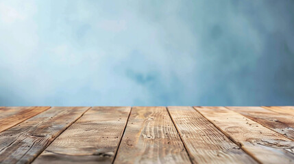 Empty thick wooden table in vintage style and blank blue wall.