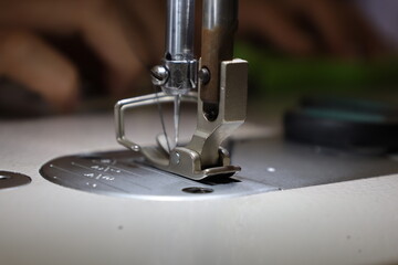 needle to insert thread, on part of the sewing machine.