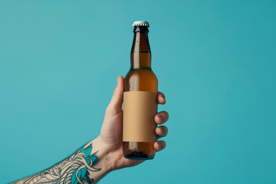 Minimalist  mockup Craft Beer Advertisement: Tattooed hand holding a Bottle on Blue